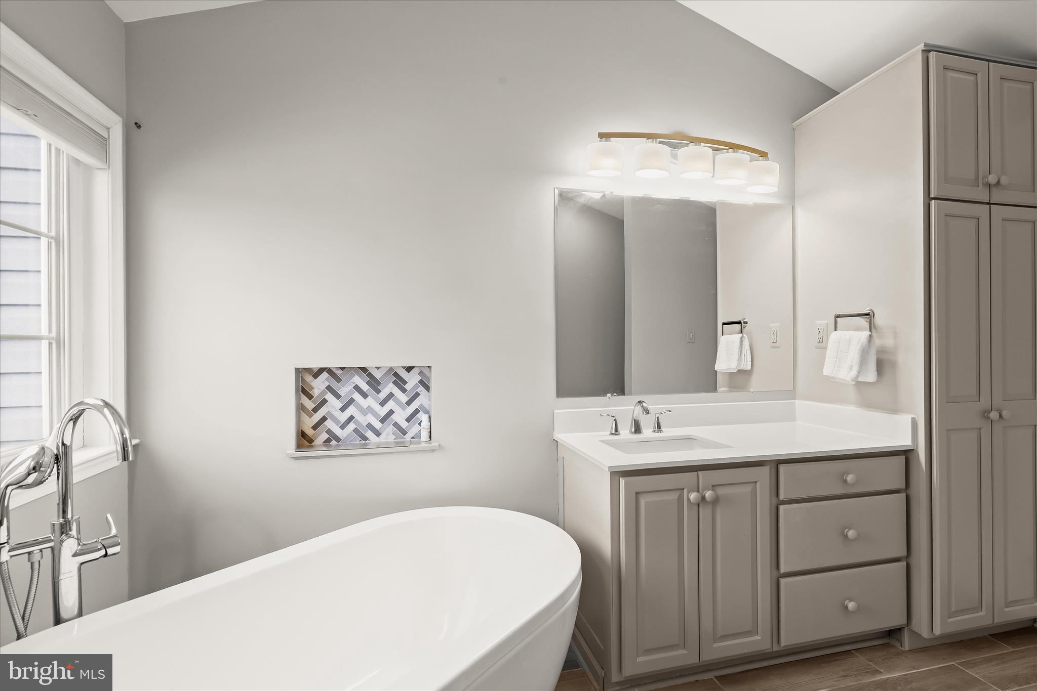 13 Farm Ridge Court Baldwin, MD 21013 - Photo 37 of 61 a bathroom with a sink and a mirror