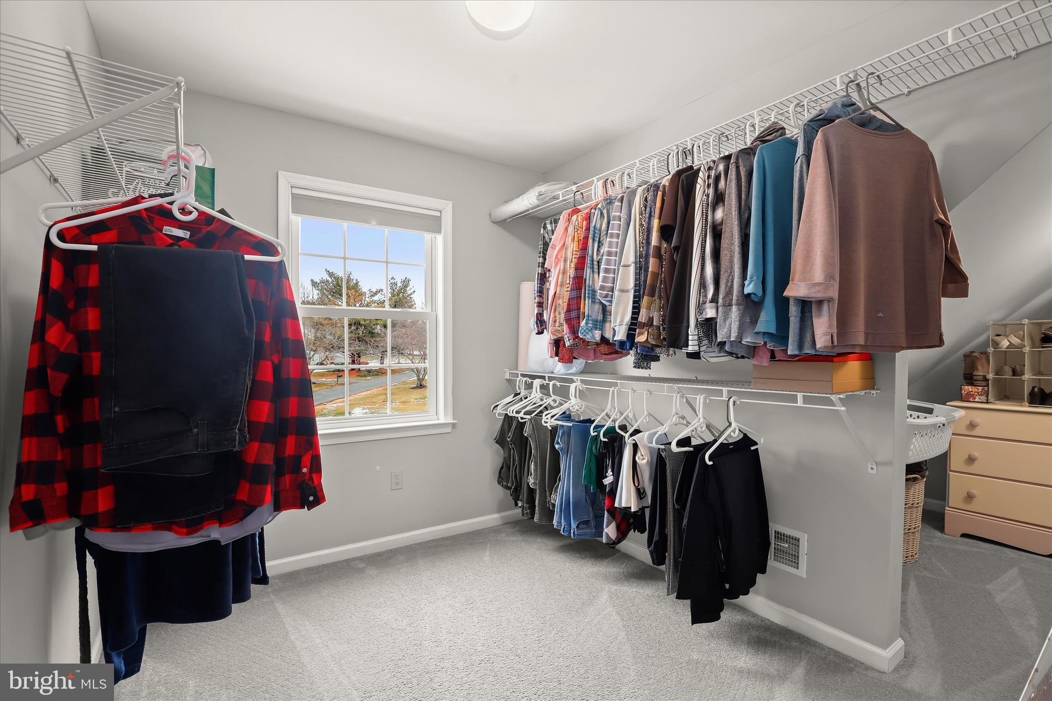 13 Farm Ridge Court Baldwin, MD 21013 - Photo 39 of 61 a view of walk in closet with clothes and shoes
