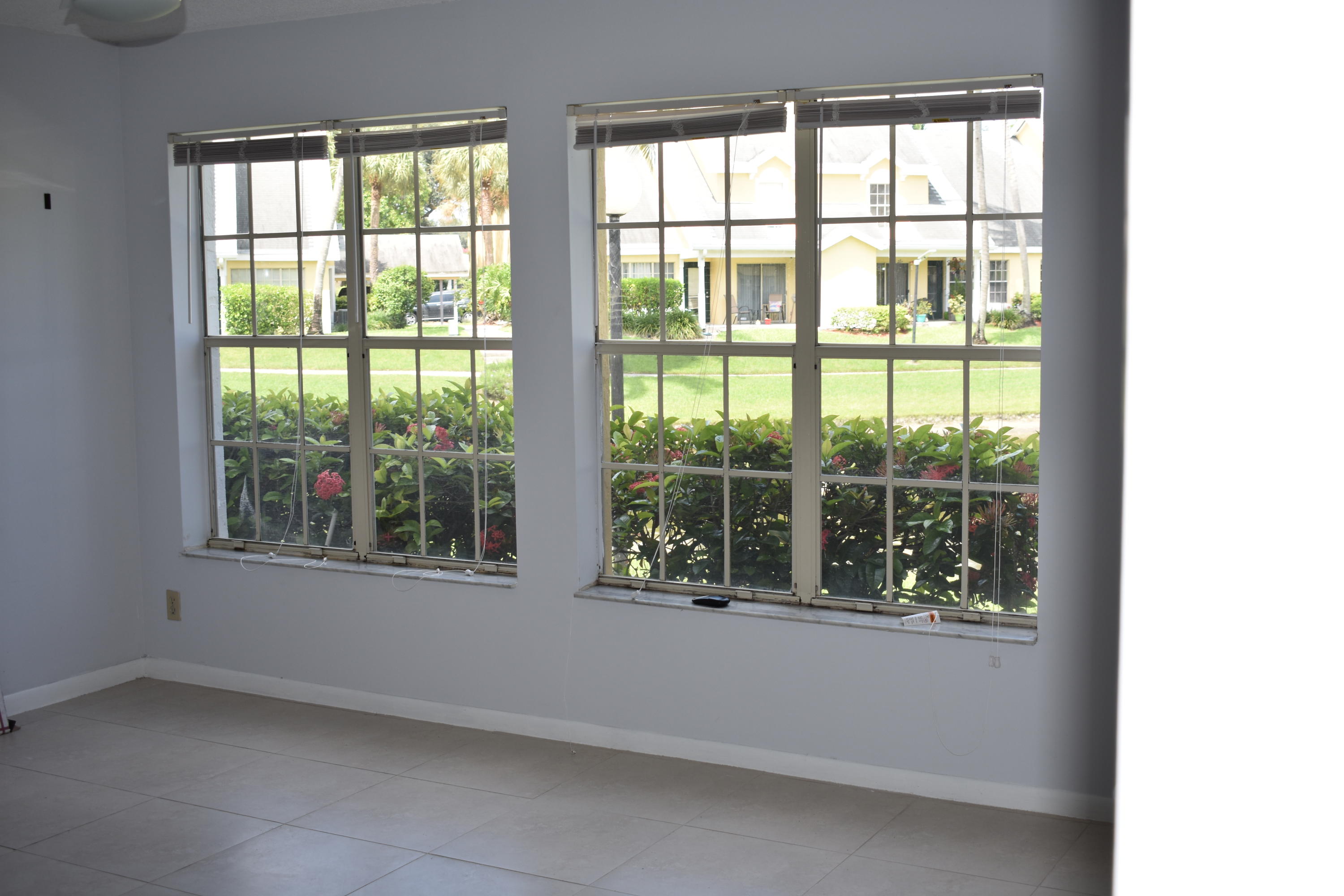 6355 La Costa Drive, Unit D Boca Raton, FL 33433 - Photo 5 of 7 lakeview from living room