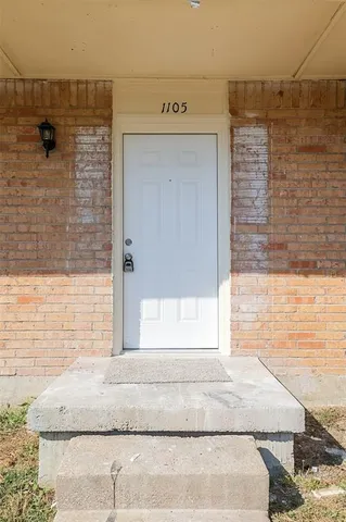 an empty room with an entryway