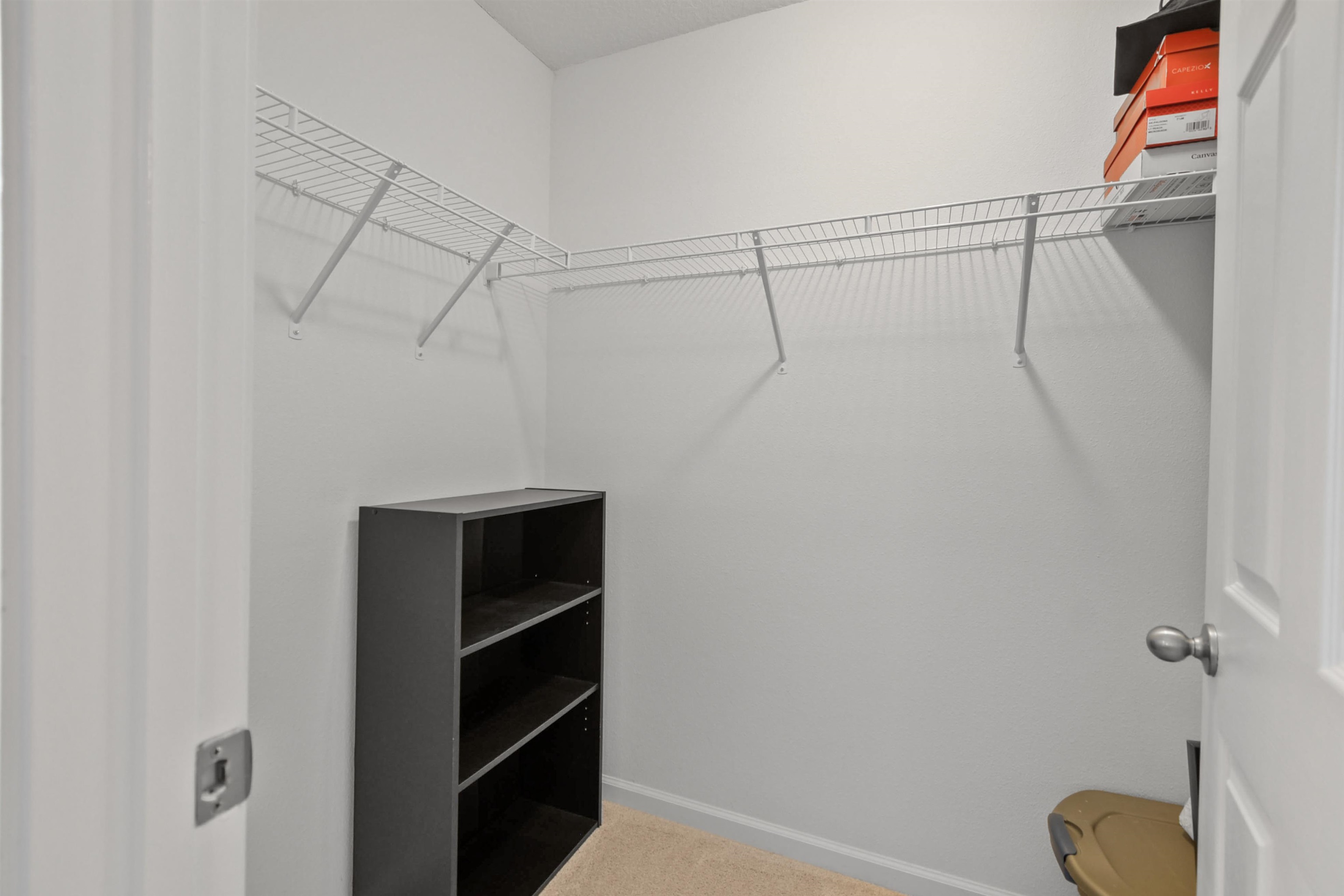 105 Ridge Lake Road St. Augustine, FL 32086 - Photo 20 of 34 a view of walk in closet with empty racks