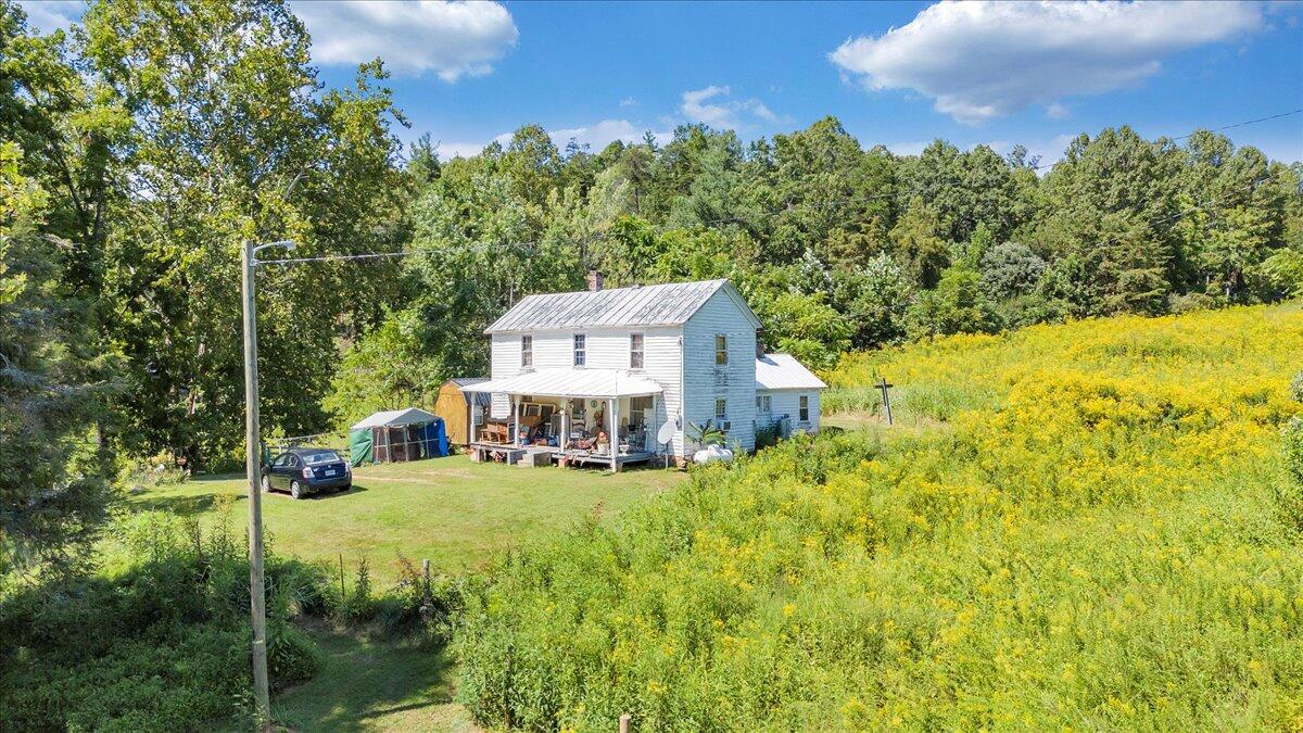 5741 Providence Church Road Ferrum, VA 24088 - Photo 45 of 52 a view of a house with a yard and sitting area