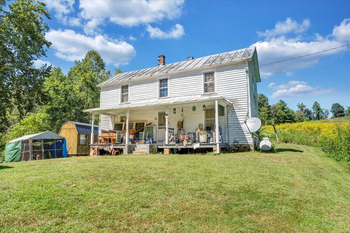 5741 Providence Church Road Ferrum, VA 24088 - Photo 47 of 52 a view of a house with a yard and sitting area