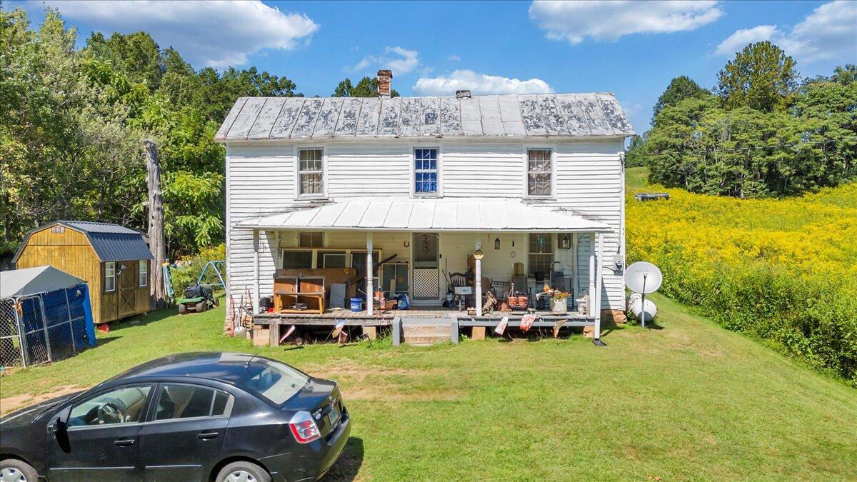 5741 Providence Church Road Ferrum, VA 24088 - Photo 48 of 52 a front view of a house with swimming pool garden and patio