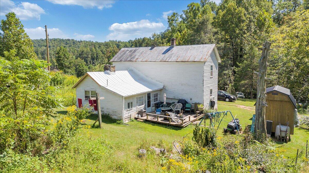 5741 Providence Church Road Ferrum, VA 24088 - Photo 51 of 52 a aerial view of a house with swimming pool and sitting area