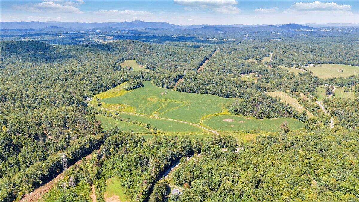 5741 Providence Church Road Ferrum, VA 24088 - Photo 8 of 52 a view of a yard in front of the house