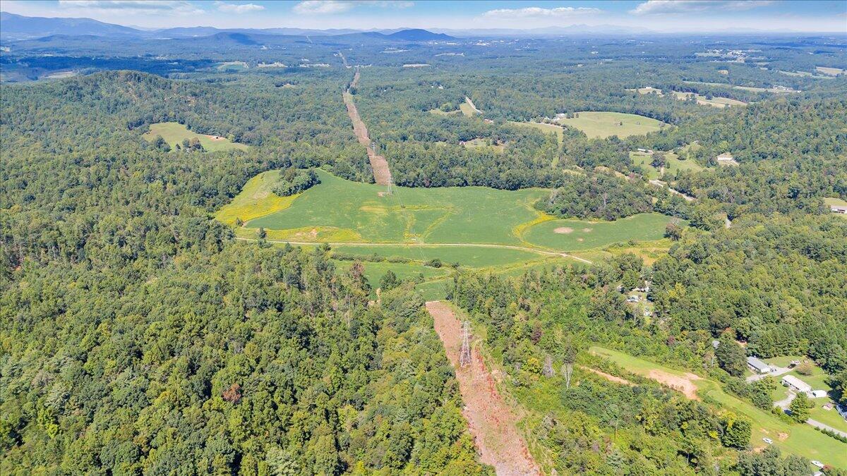 5741 Providence Church Road Ferrum, VA 24088 - Photo 9 of 52 a view of a lake with a mountain