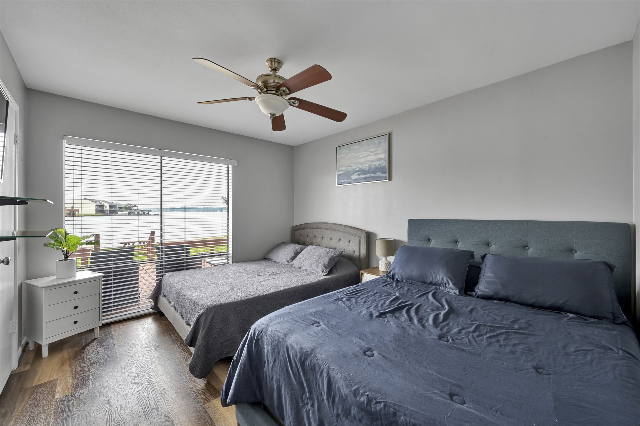 124 April Point Drive North Montgomery, TX 77356 - Photo 17 of 26 a bedroom with two beds and a large window