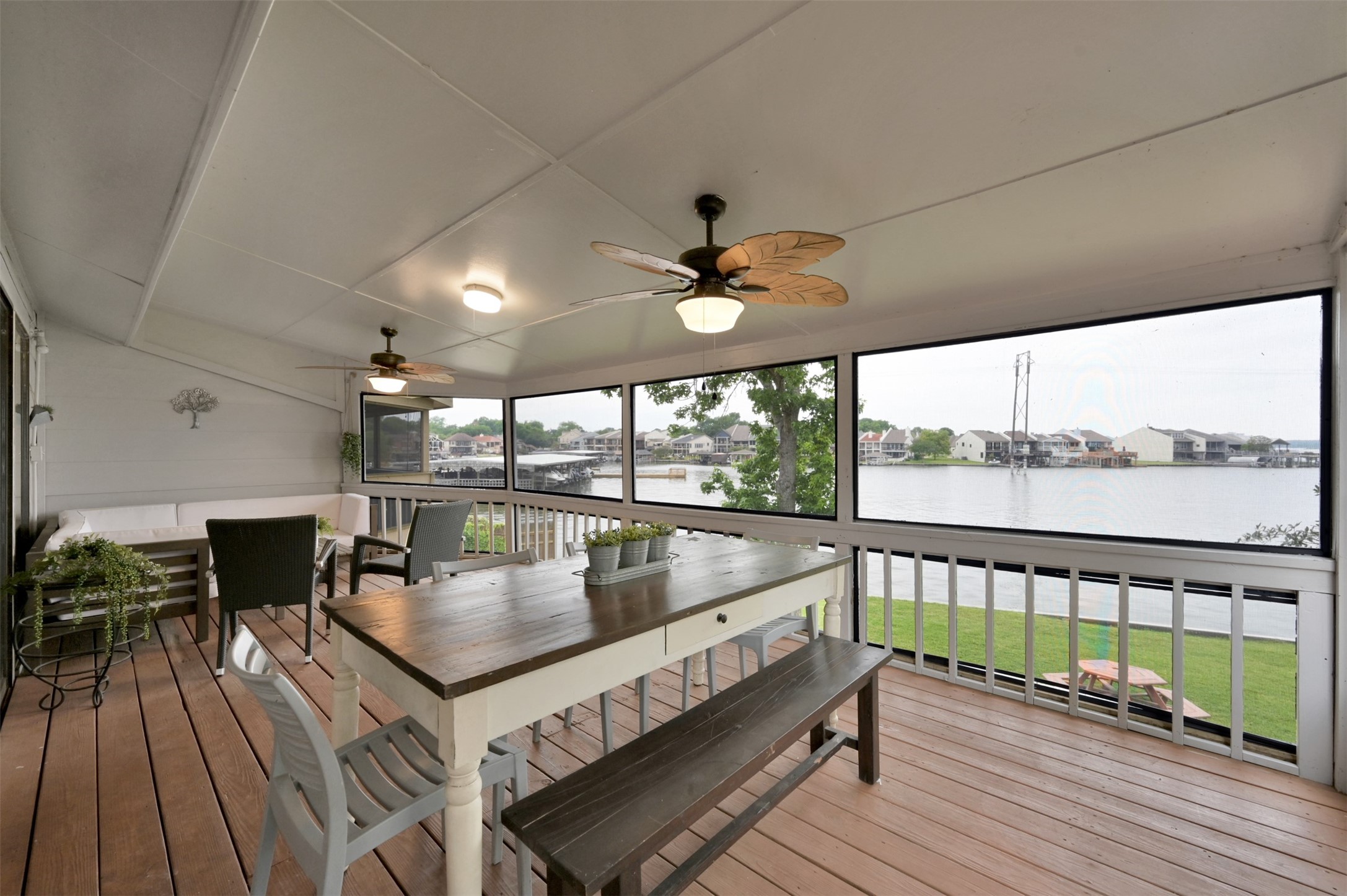124 April Point Drive North Montgomery, TX 77356 - Photo 21 of 26 a balcony with furniture and wooden floor
