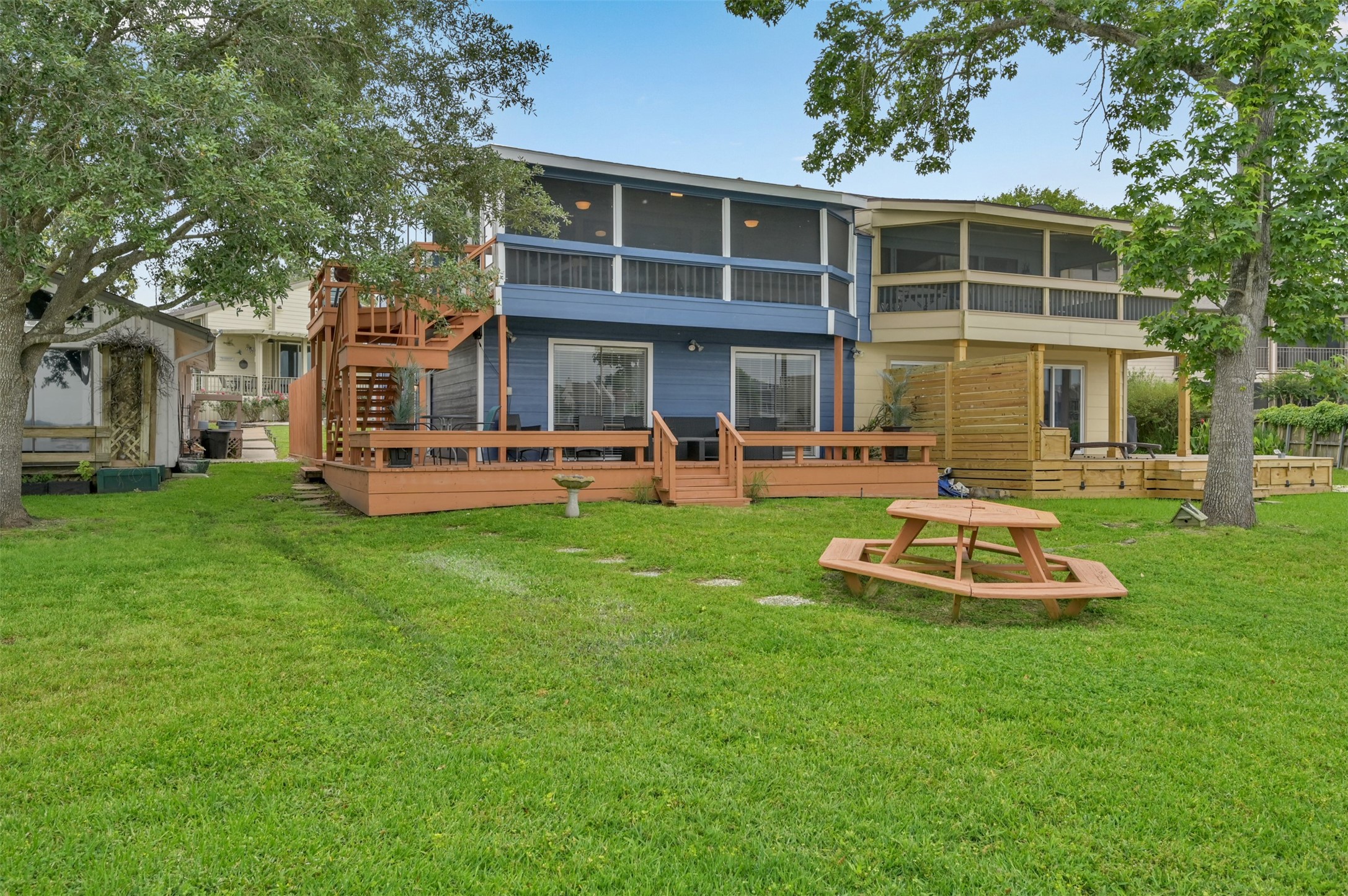 124 April Point Drive North Montgomery, TX 77356 - Photo 23 of 26 a front view of a house with a yard table and chairs