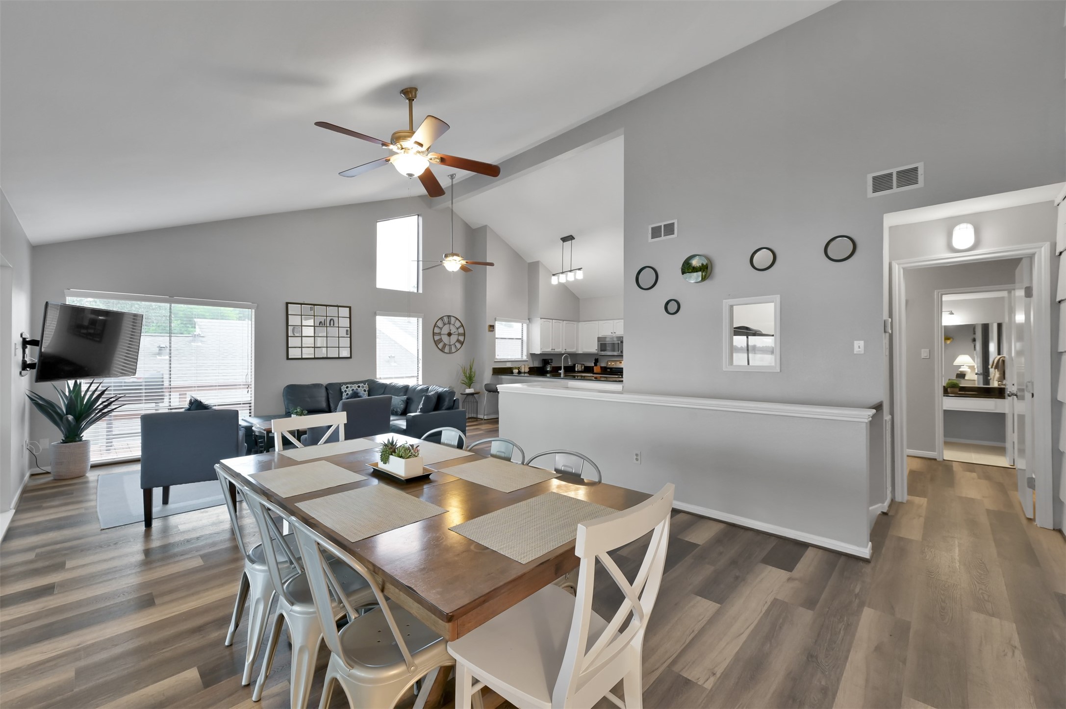 124 April Point Drive North Montgomery, TX 77356 - Photo 7 of 26 a view of a dining room with furniture and wooden floor