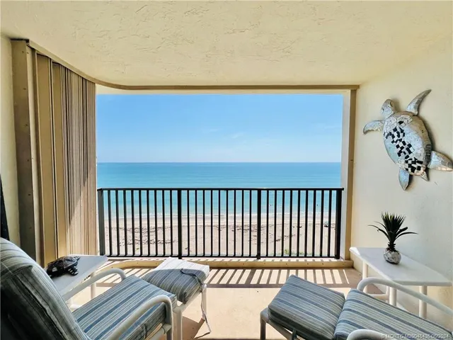 a bedroom with a bed and flat screen tv