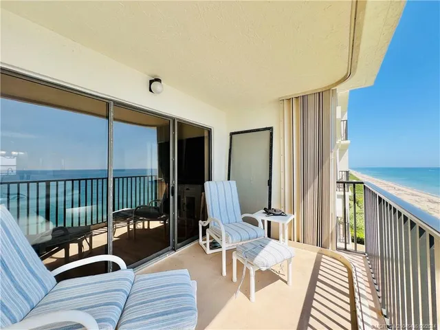 a spacious bathroom with a double vanity sink a mirror and a shower