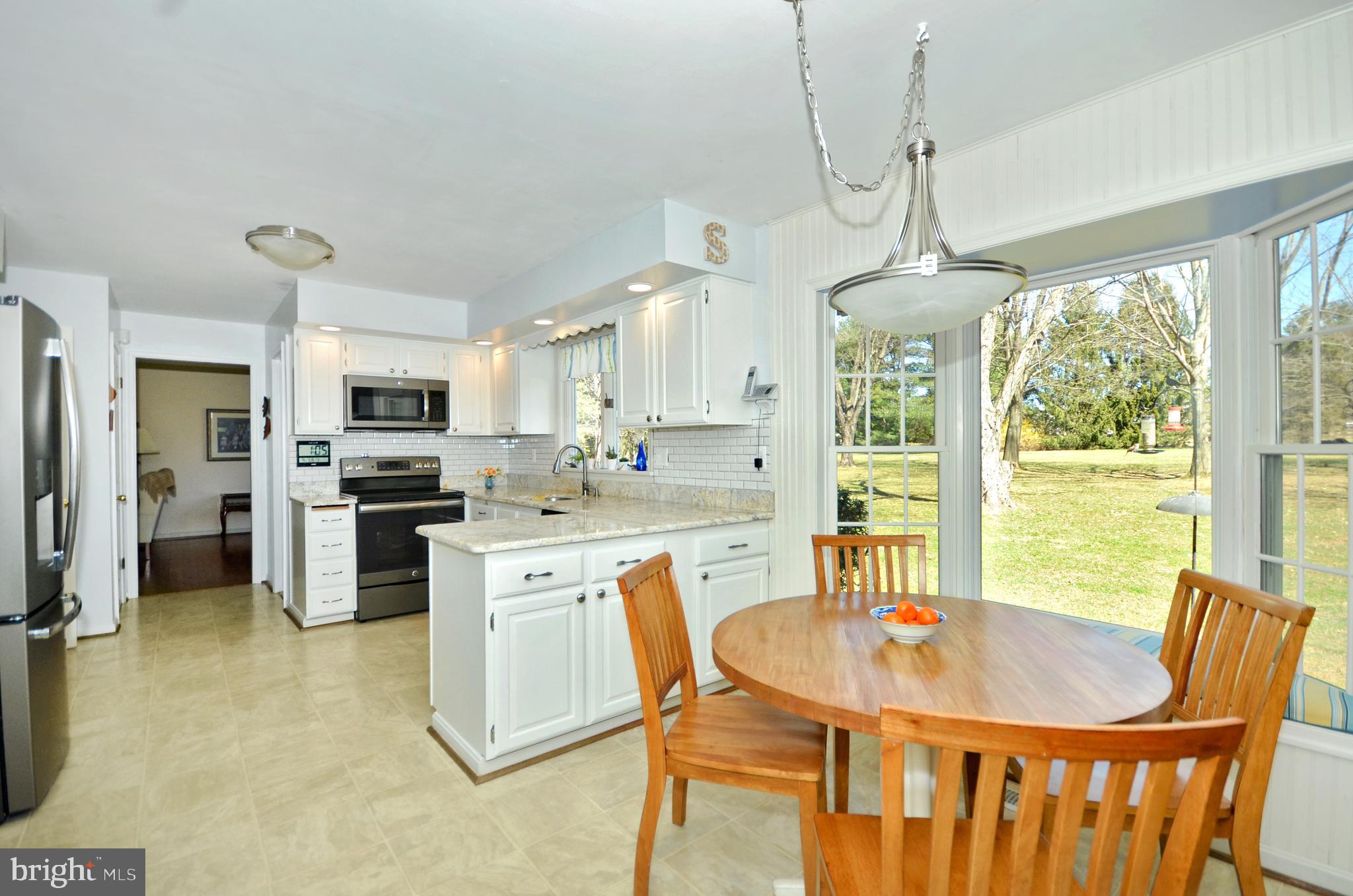 Bright & Sunny eat-in kitchen with bay window.