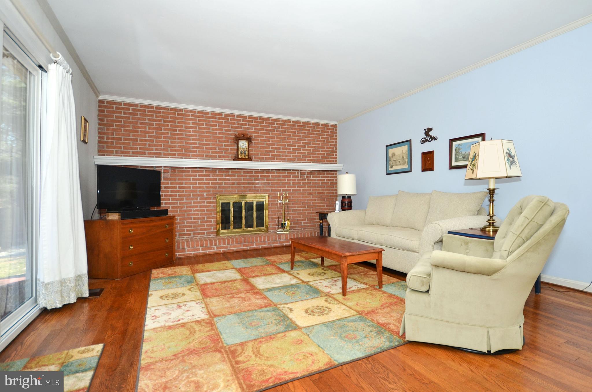 12917 Gent Road Reisterstown, MD 21136 - Photo 8 of 37 Family room with wood-burning fireplace.