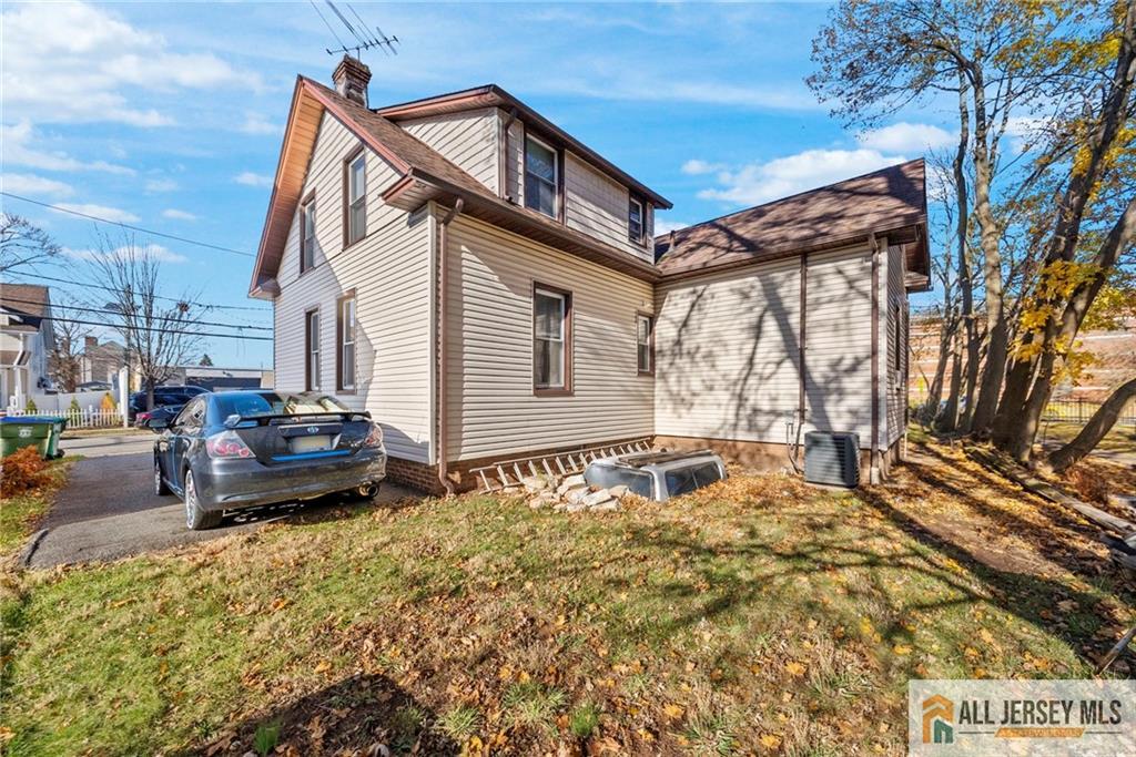 2102 Woodbridge Avenue, Unit 2 Edison, NJ 08817 - Photo 18 of 19 a house view with a backyard space