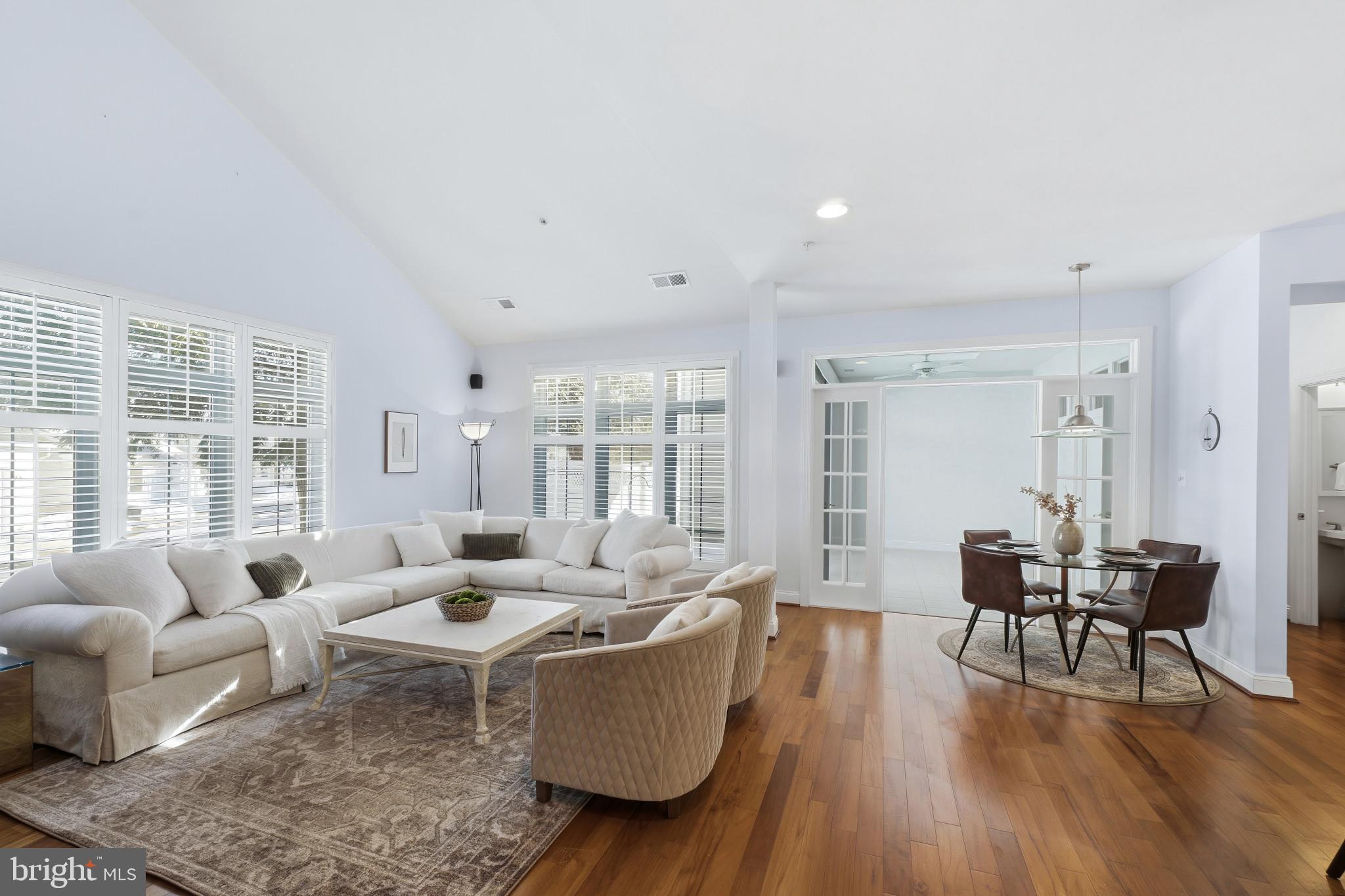 2607 Buckingham Road, Unit 78 Ellicott City, MD 21043 - Photo 12 of 43 a living room with furniture and wooden floor