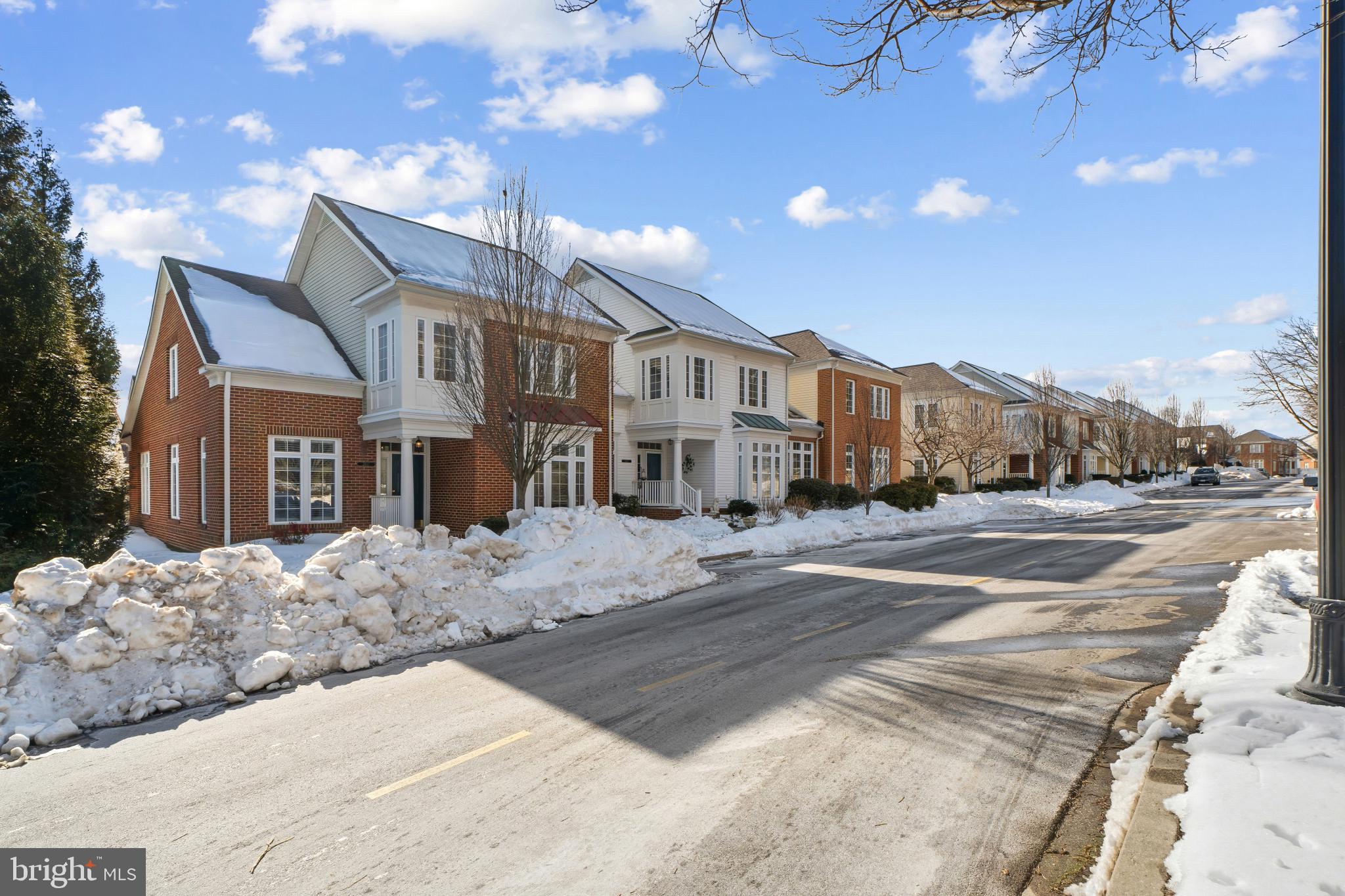 2607 Buckingham Road, Unit 78 Ellicott City, MD 21043 - Photo 2 of 43 a view of multiple houses with a street