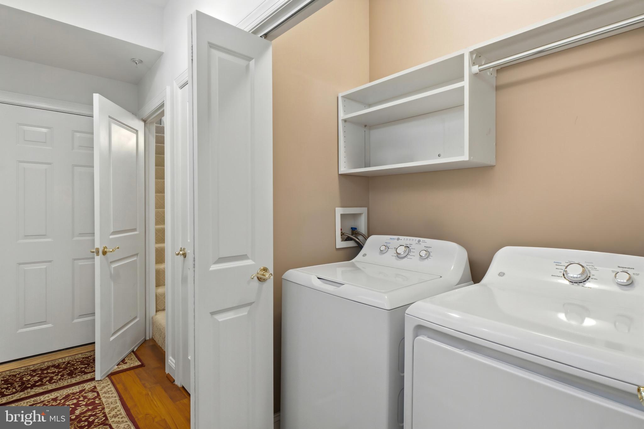 2607 Buckingham Road, Unit 78 Ellicott City, MD 21043 - Photo 22 of 43 a utility room with dryer and washer