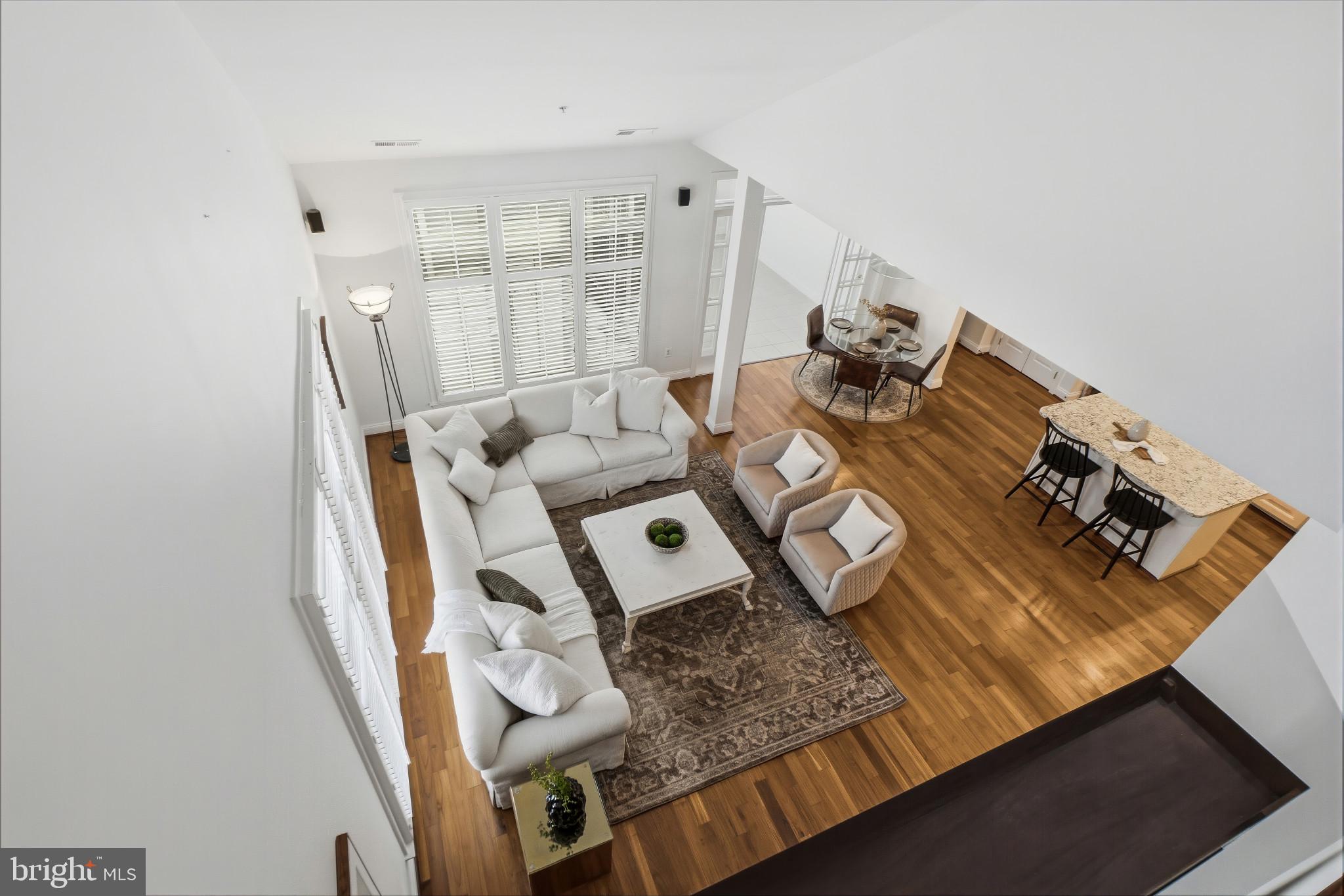 2607 Buckingham Road, Unit 78 Ellicott City, MD 21043 - Photo 27 of 43 a view of living room with furniture and floor to ceiling windows