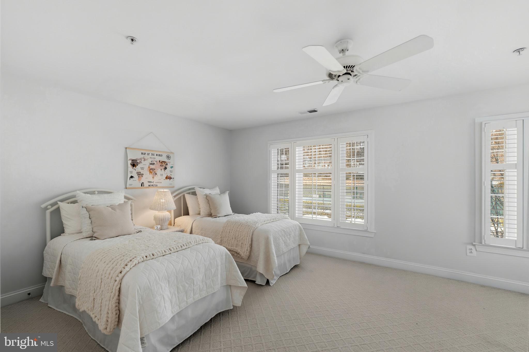 2607 Buckingham Road, Unit 78 Ellicott City, MD 21043 - Photo 28 of 43 a spacious bedroom with two beds and a window