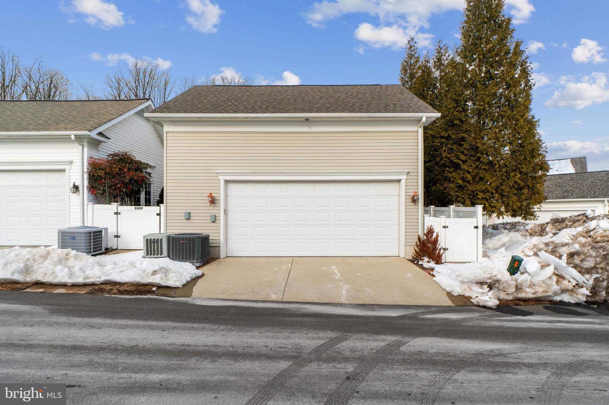2607 Buckingham Road, Unit 78 Ellicott City, MD 21043 - Photo 39 of 43 a view of white house with a yard