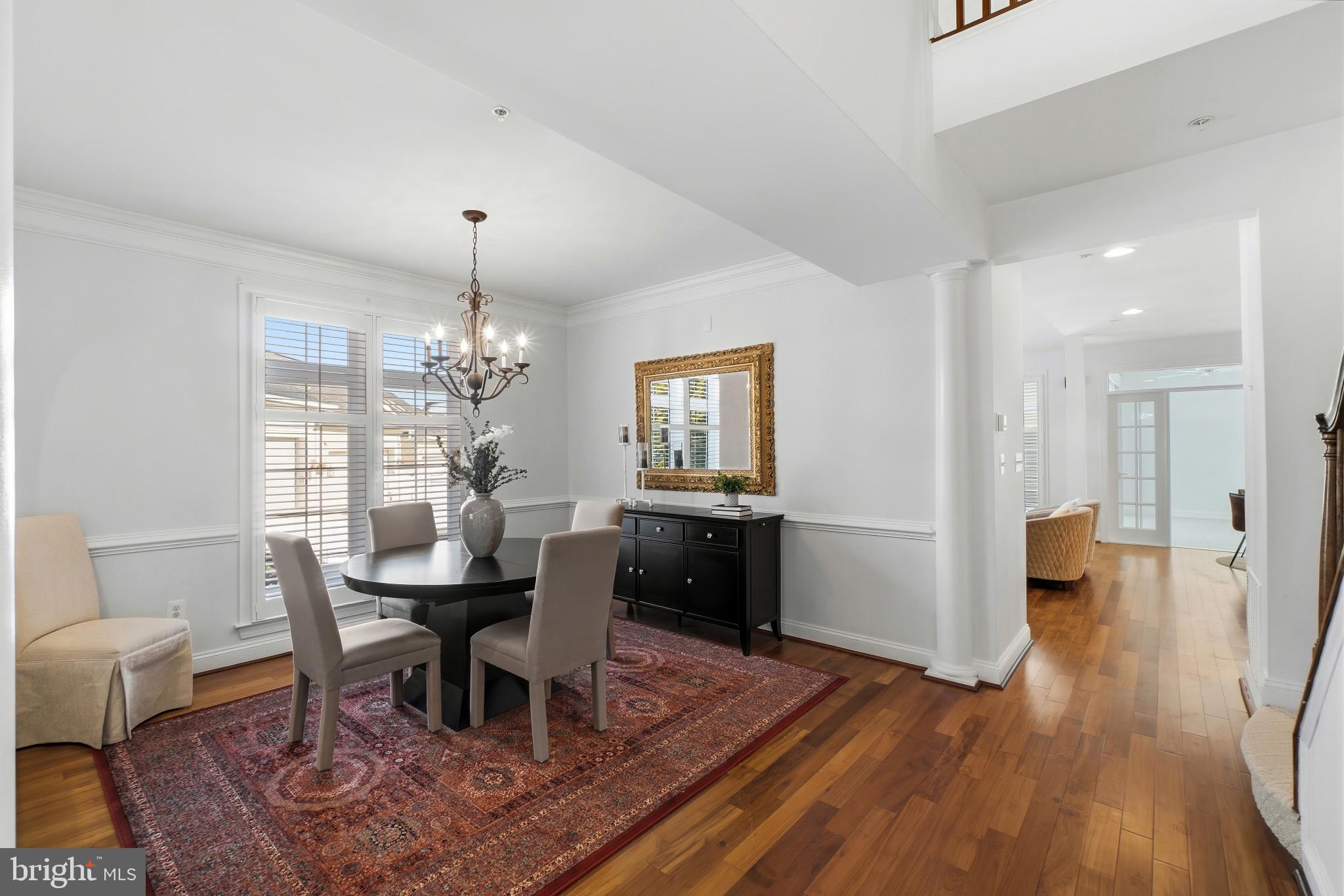 2607 Buckingham Road, Unit 78 Ellicott City, MD 21043 - Photo 6 of 43 a dining room with wooden floor and breakfast area
