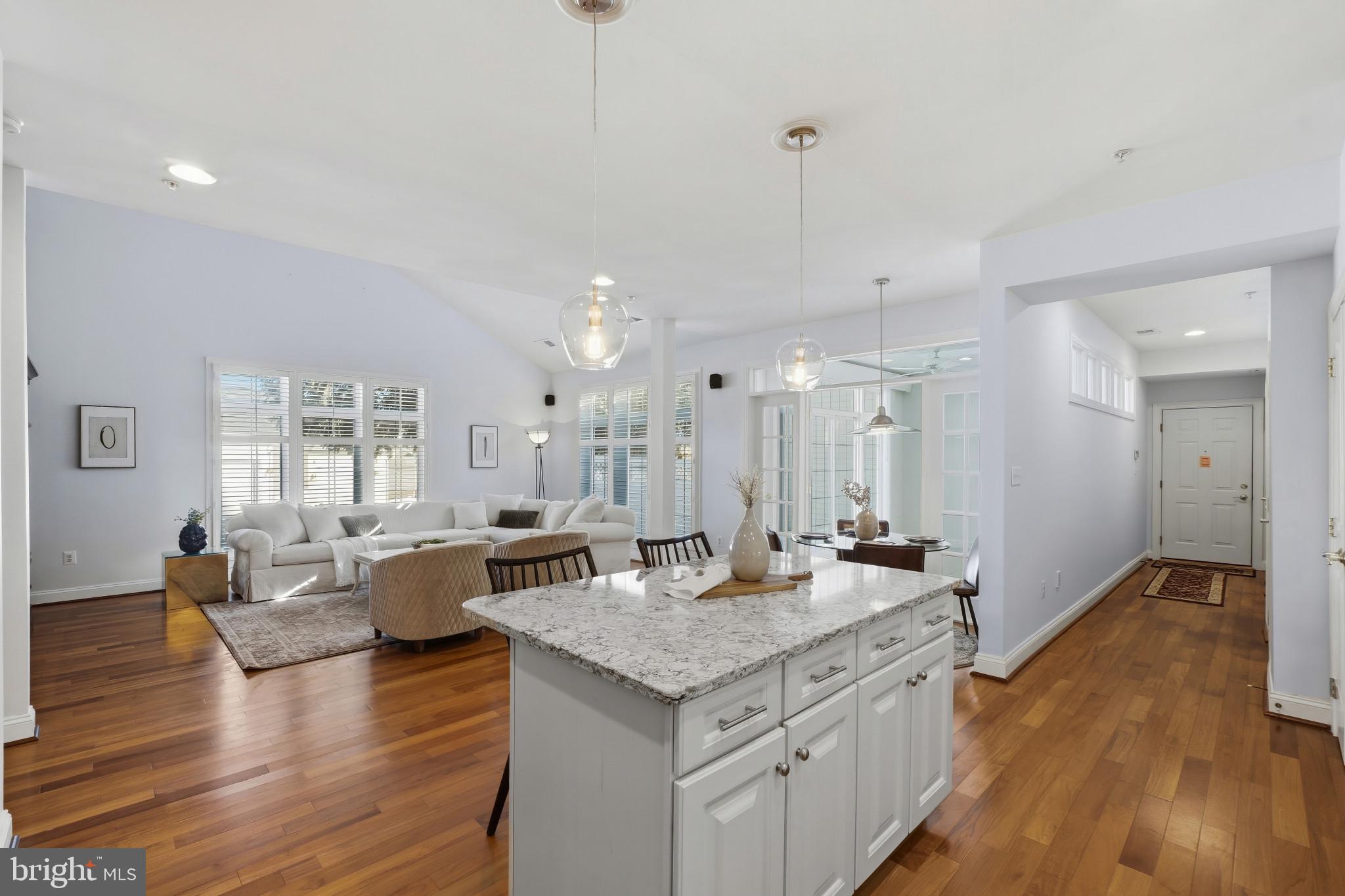 2607 Buckingham Road, Unit 78 Ellicott City, MD 21043 - Photo 9 of 43 a view of living room with granite countertop furniture and wooden floor