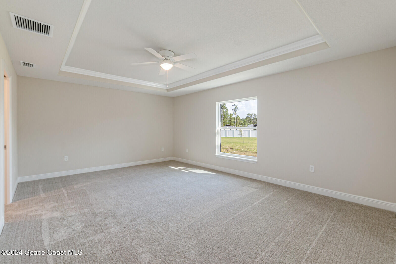 347 Trilby Road Southwest Palm Bay, FL 32908 - Photo 9 of 9 a view of an empty room with a window