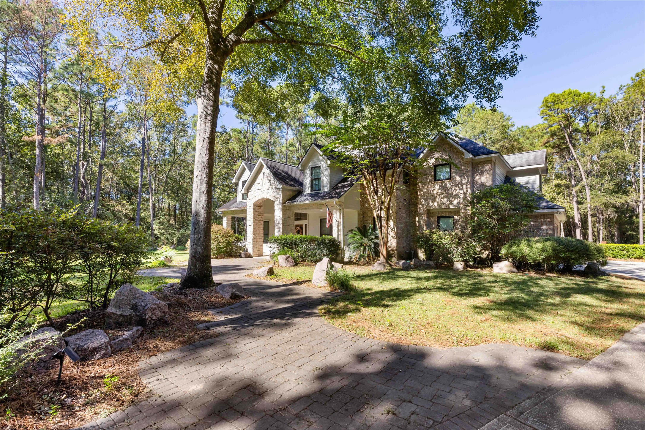 13322 Stonecrest Lane Conroe, TX 77302 - Photo 3 of 50 a view of a house with backyard