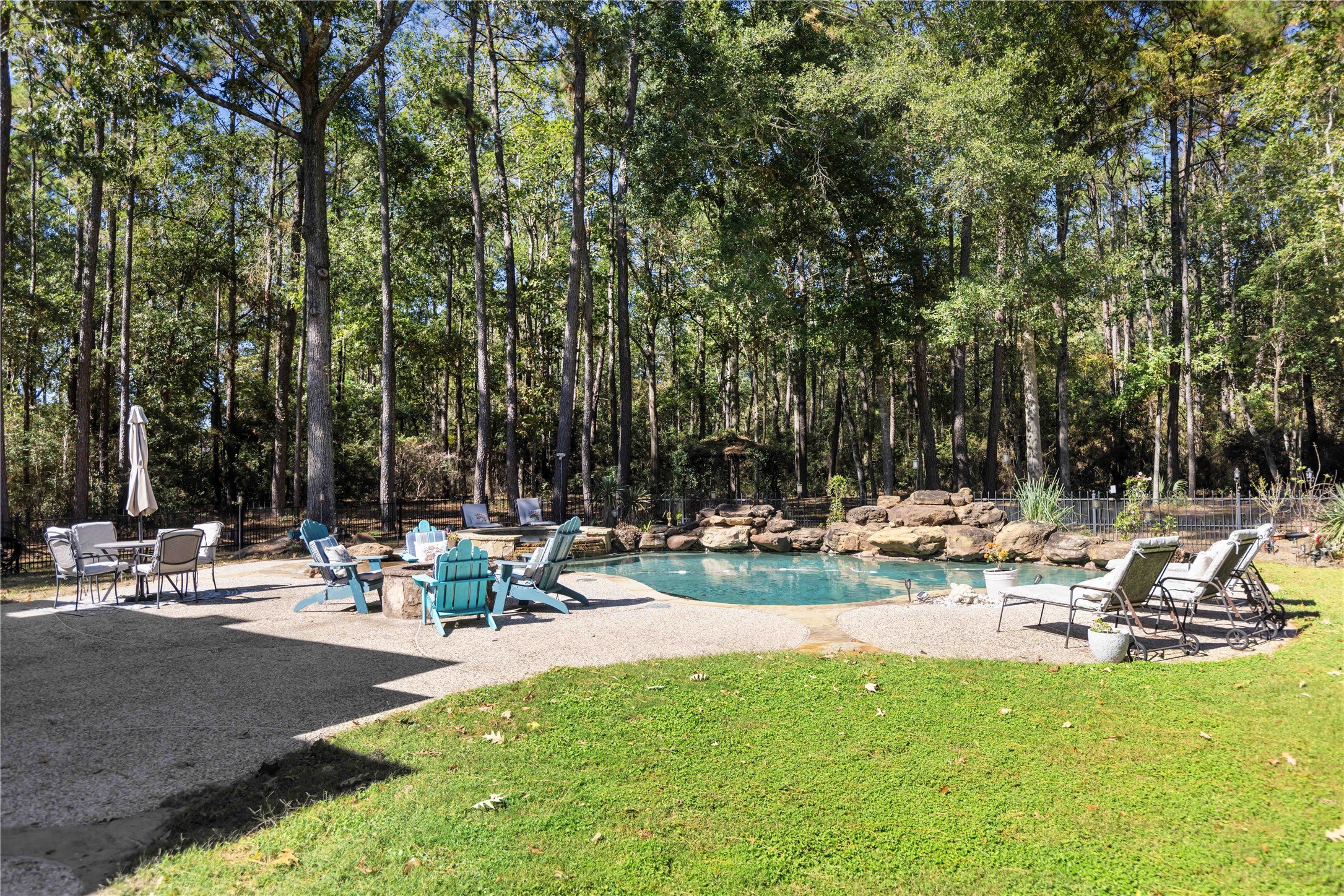 13322 Stonecrest Lane Conroe, TX 77302 - Photo 37 of 50 a view of a park with sitting area