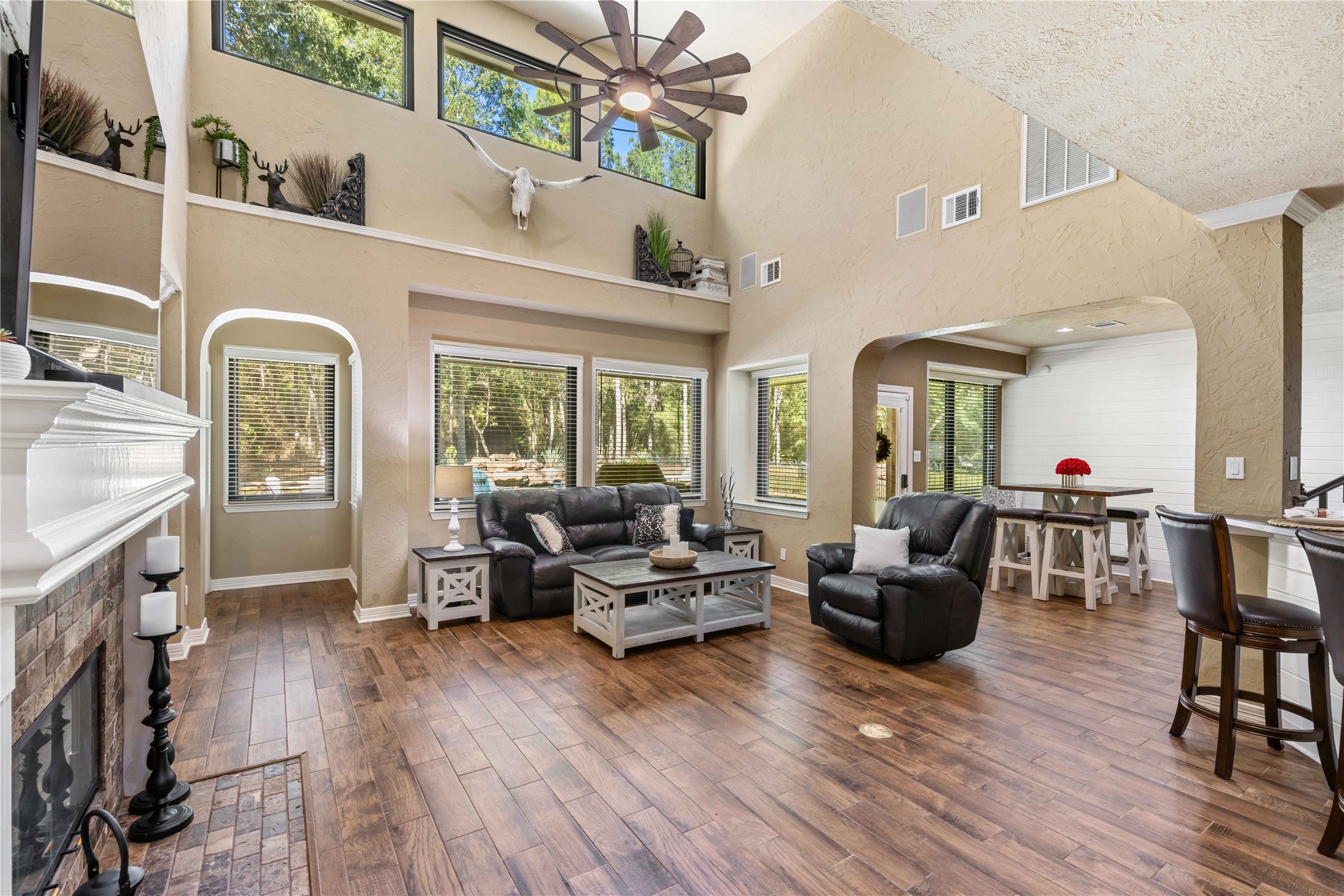 13322 Stonecrest Lane Conroe, TX 77302 - Photo 10 of 50 a living room with furniture and a wooden floor