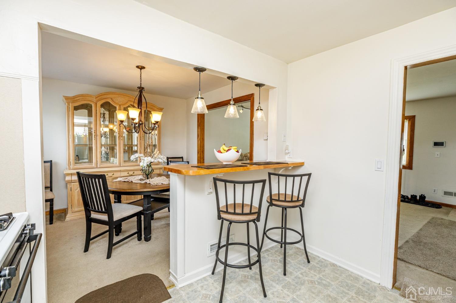 2761 Hickory Road Union, NJ 07083 - Photo 11 of 30 a view of a a dining room with furniture and window