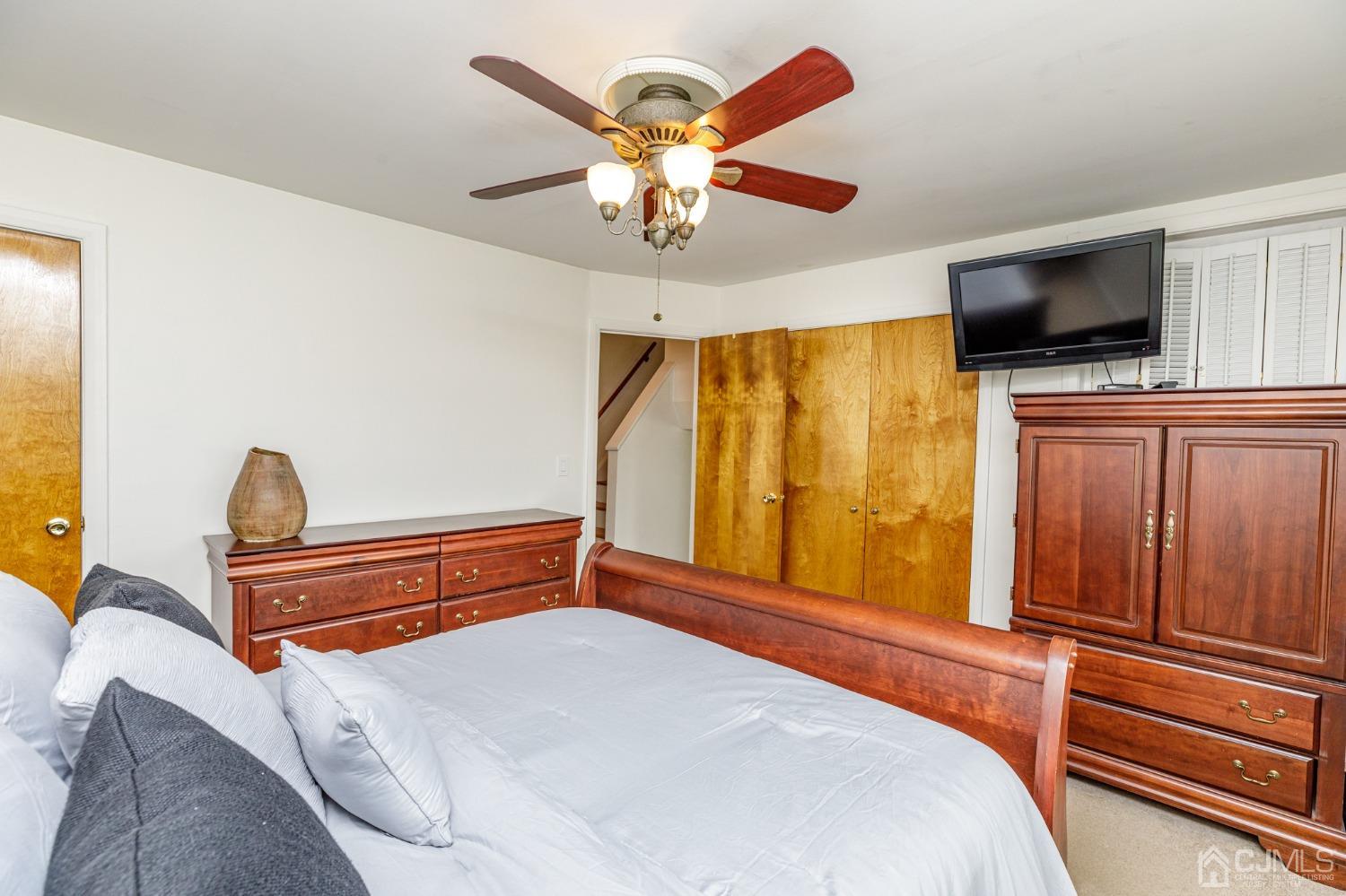 2761 Hickory Road Union, NJ 07083 - Photo 13 of 30 a bedroom with a bed and wooden floor