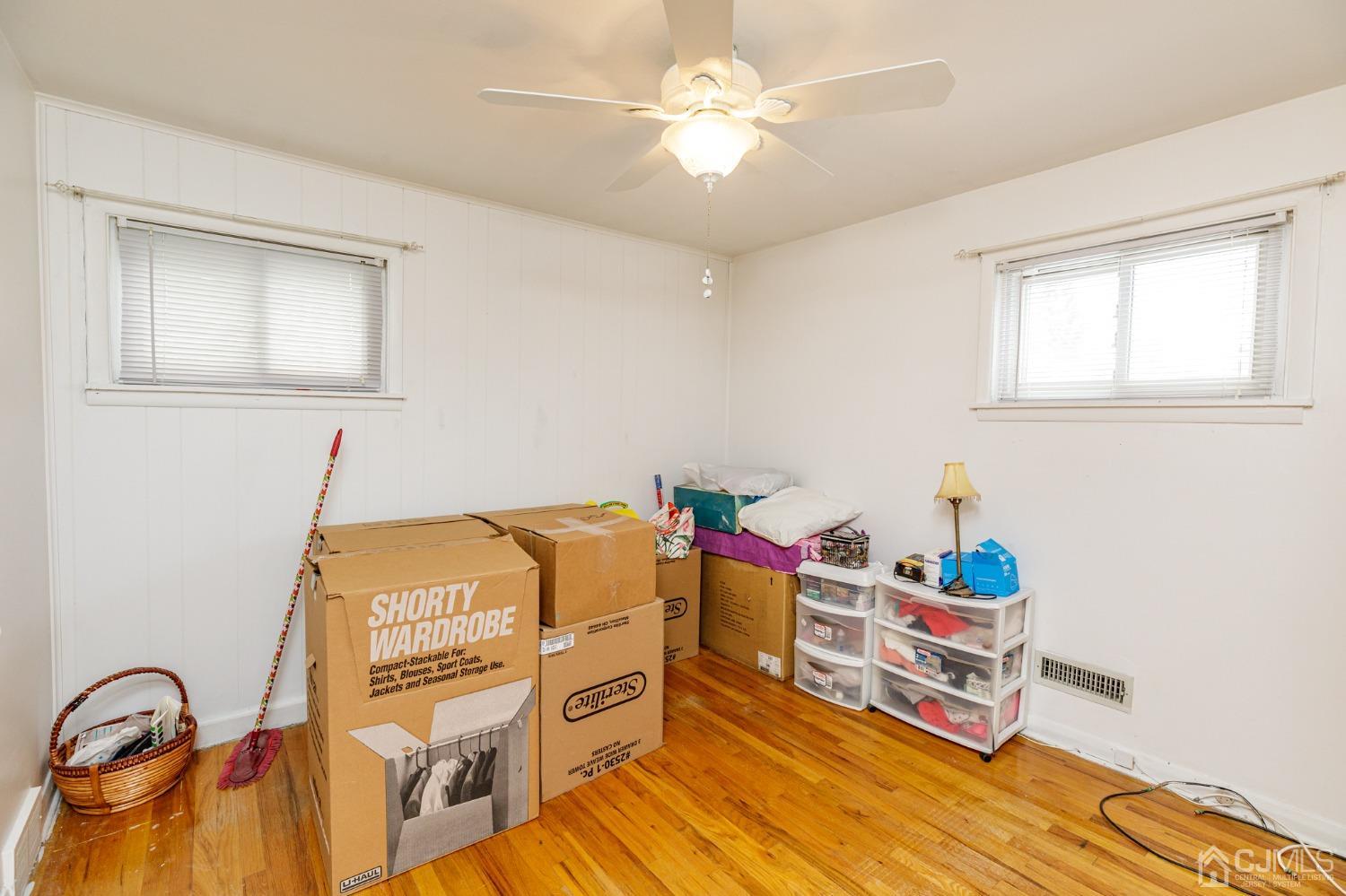 2761 Hickory Road Union, NJ 07083 - Photo 15 of 30 a bedroom with a bed and wooden floor