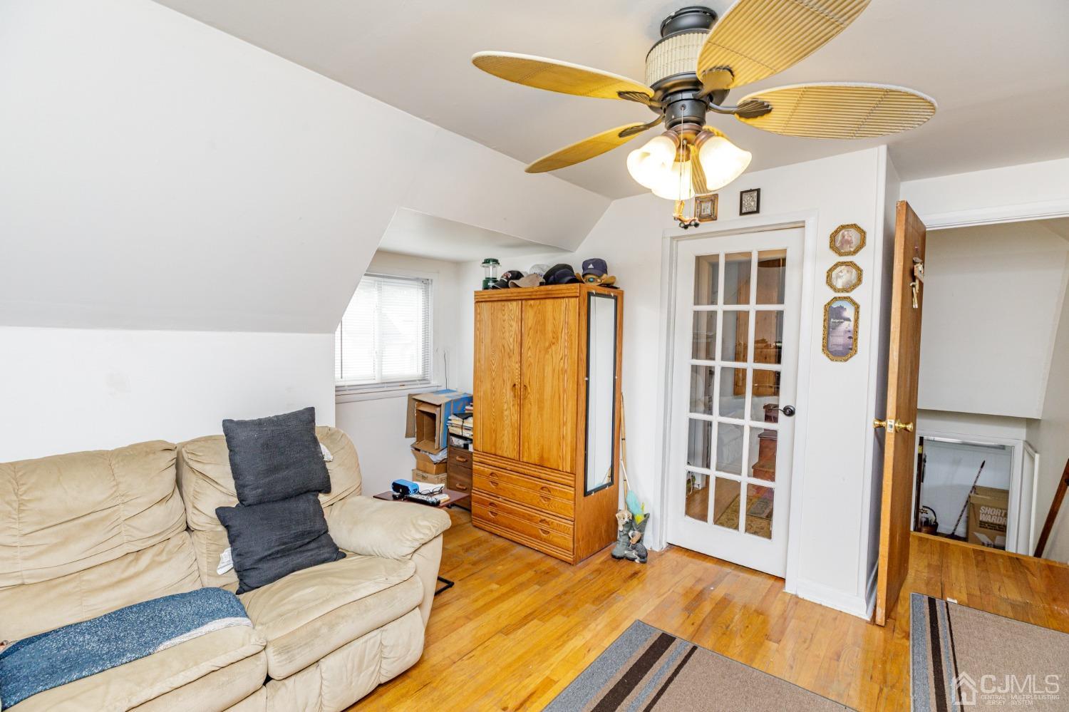 2761 Hickory Road Union, NJ 07083 - Photo 19 of 30 a living room with furniture and a chandelier