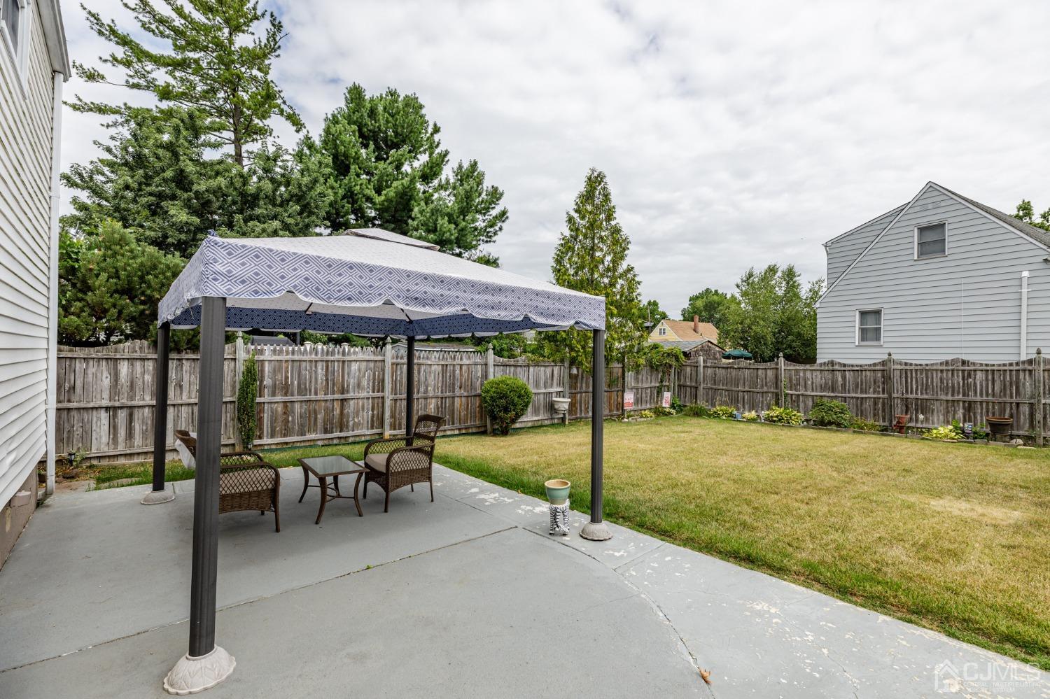 2761 Hickory Road Union, NJ 07083 - Photo 25 of 30 a patio with a table and chairs
