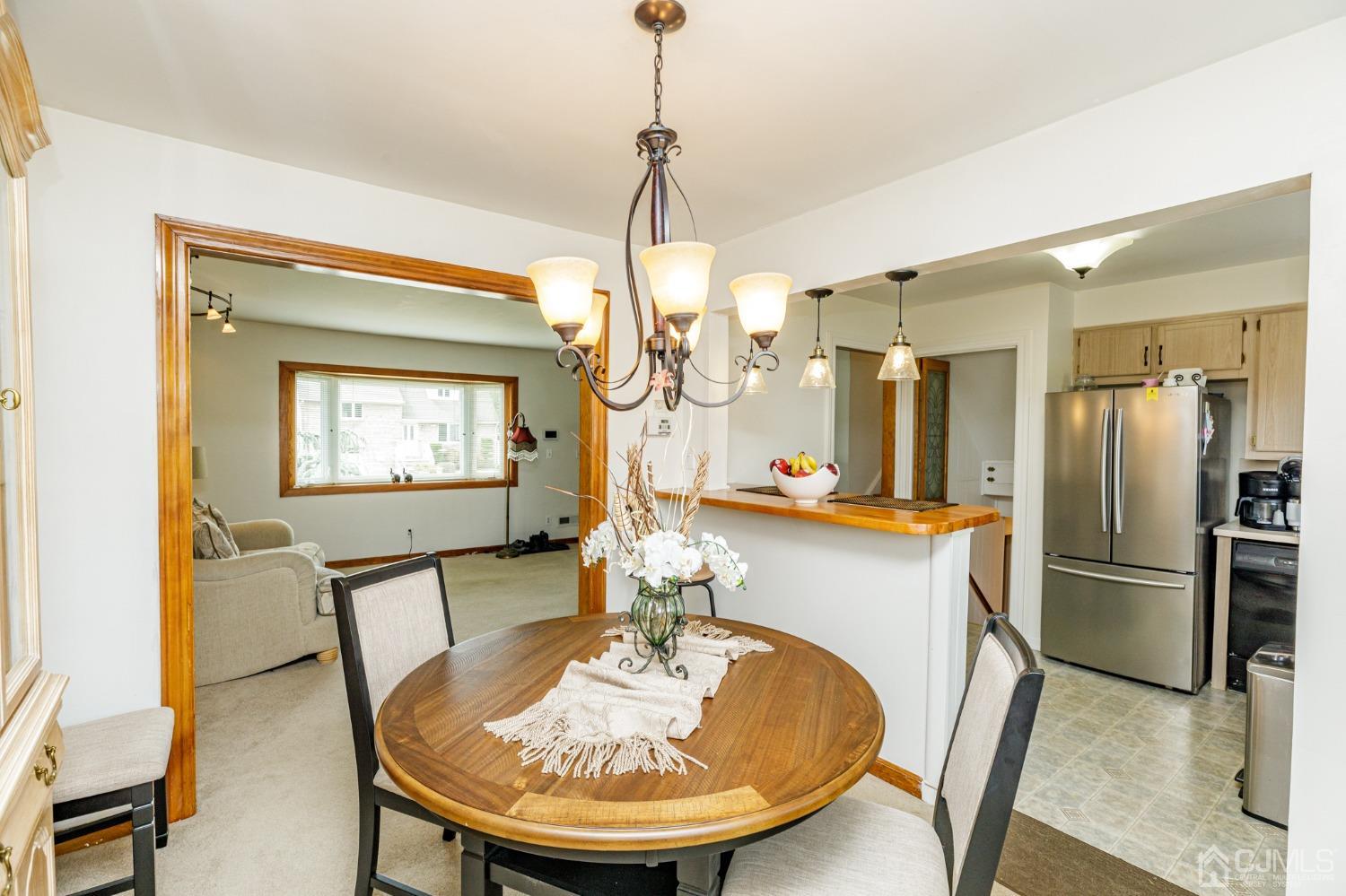 2761 Hickory Road Union, NJ 07083 - Photo 7 of 30 a view of a dining room with furniture window and wooden floor