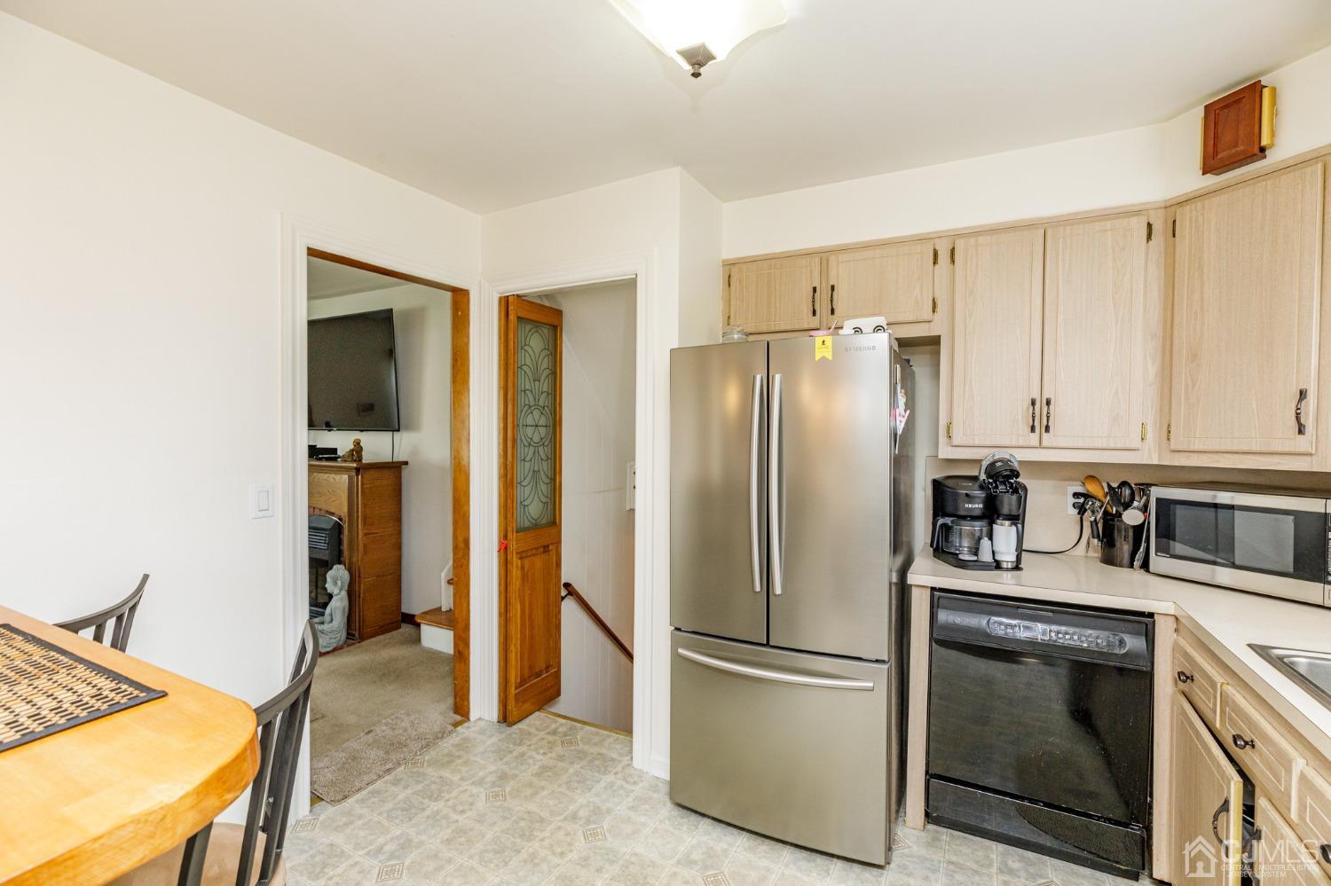 2761 Hickory Road Union, NJ 07083 - Photo 8 of 30 a kitchen with stainless steel appliances granite countertop a refrigerator and a stove