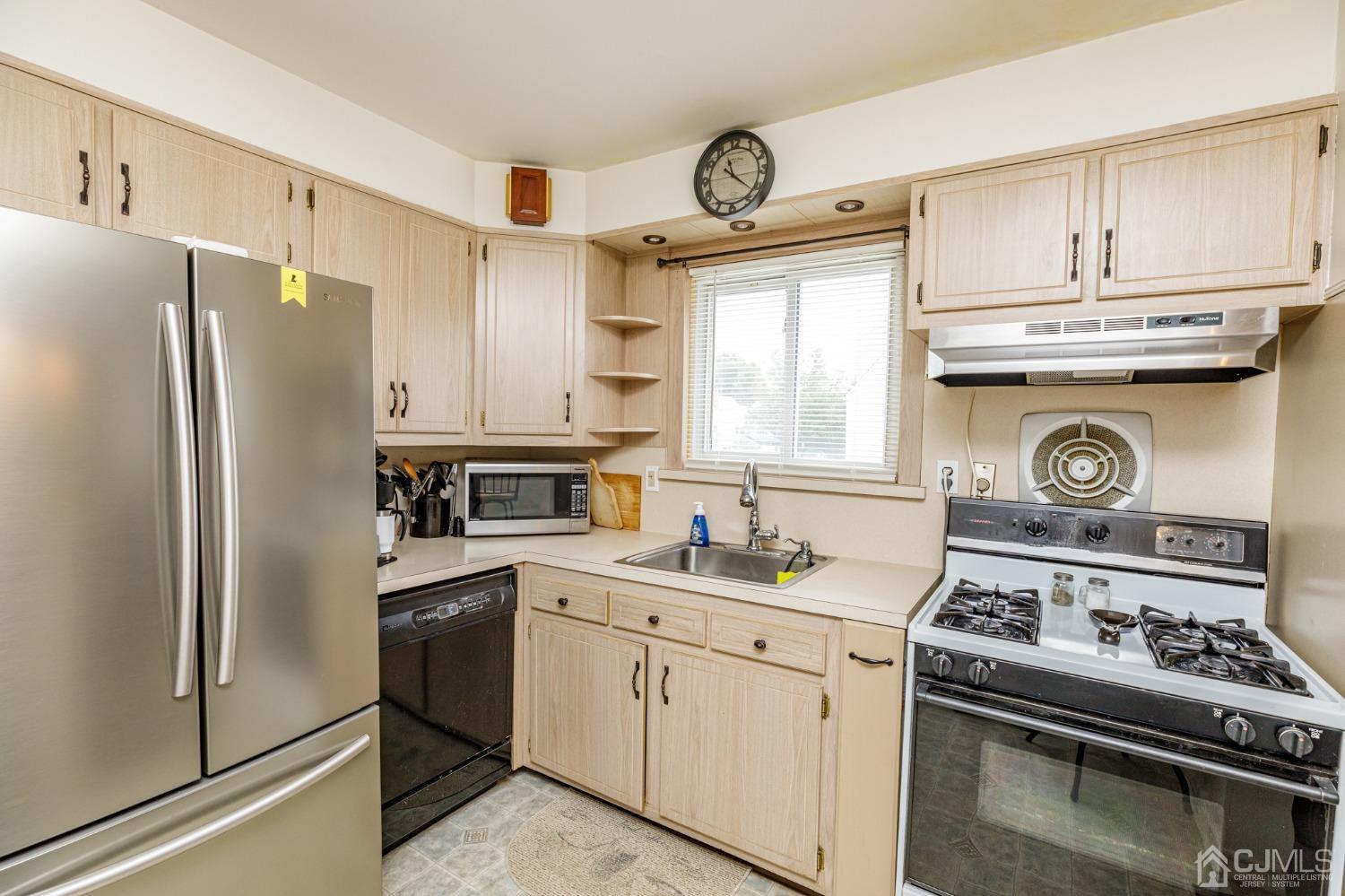 2761 Hickory Road Union, NJ 07083 - Photo 10 of 30 a kitchen with appliances cabinets and a sink