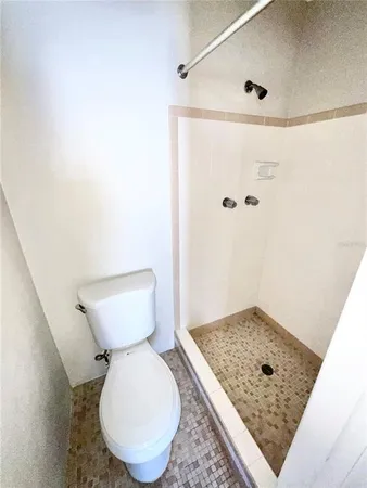 a bathroom with a toilet and a sink