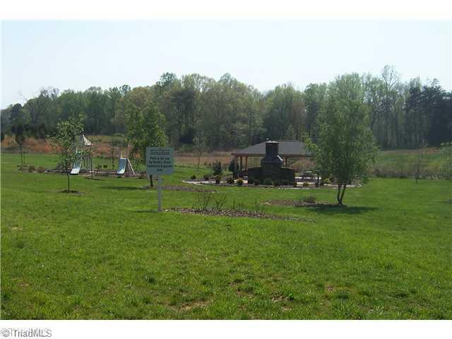 7774 Sutter Road Greensboro, NC 27455 - Photo 16 of 16 Other. Playground and shelter for neighborhood