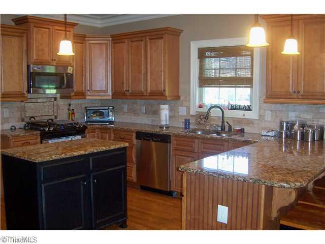 7774 Sutter Road Greensboro, NC 27455 - Photo 8 of 16 Kitchen.