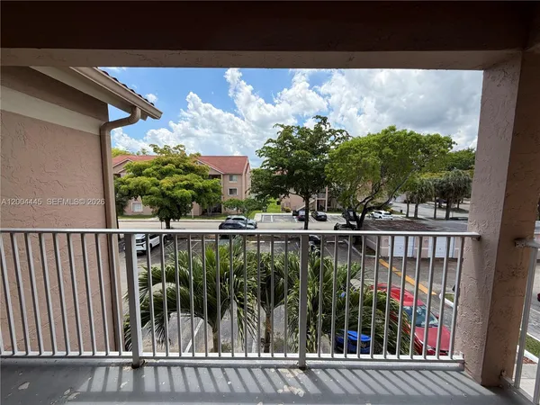 a view of a balcony with lake view
