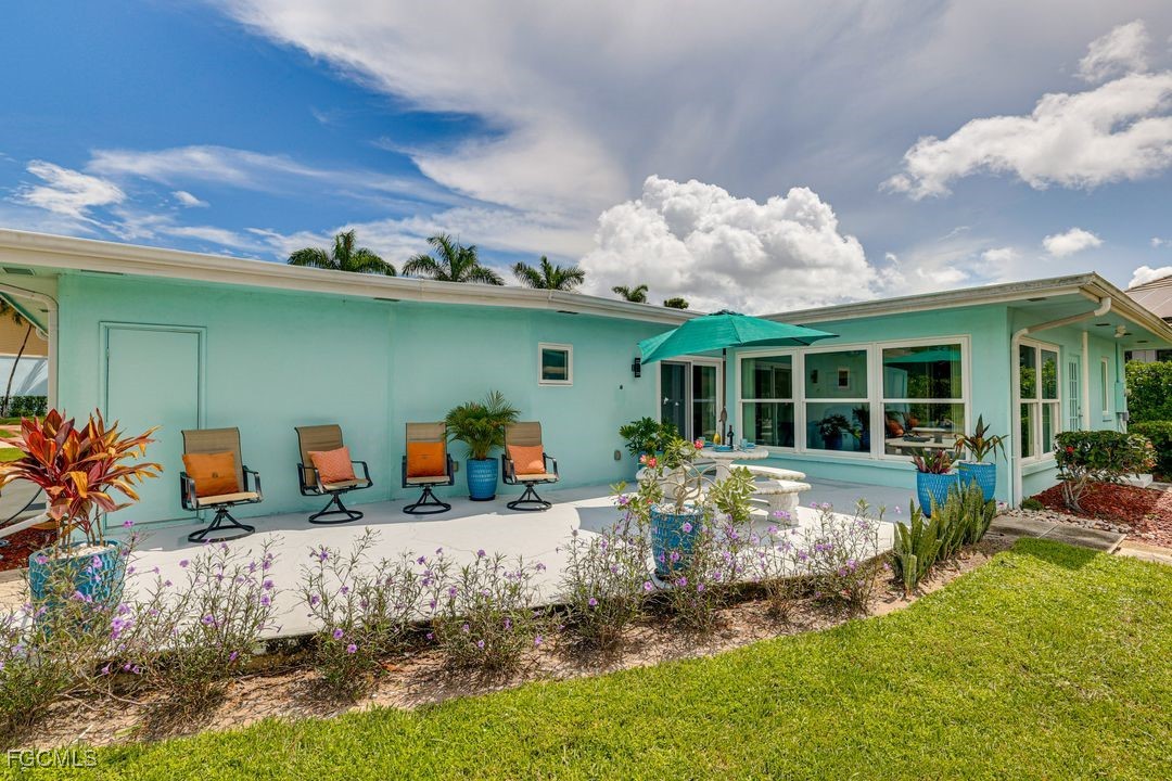 15340 River By Road Fort Myers, FL 33908 - Photo 20 of 21 a front view of a house with patio