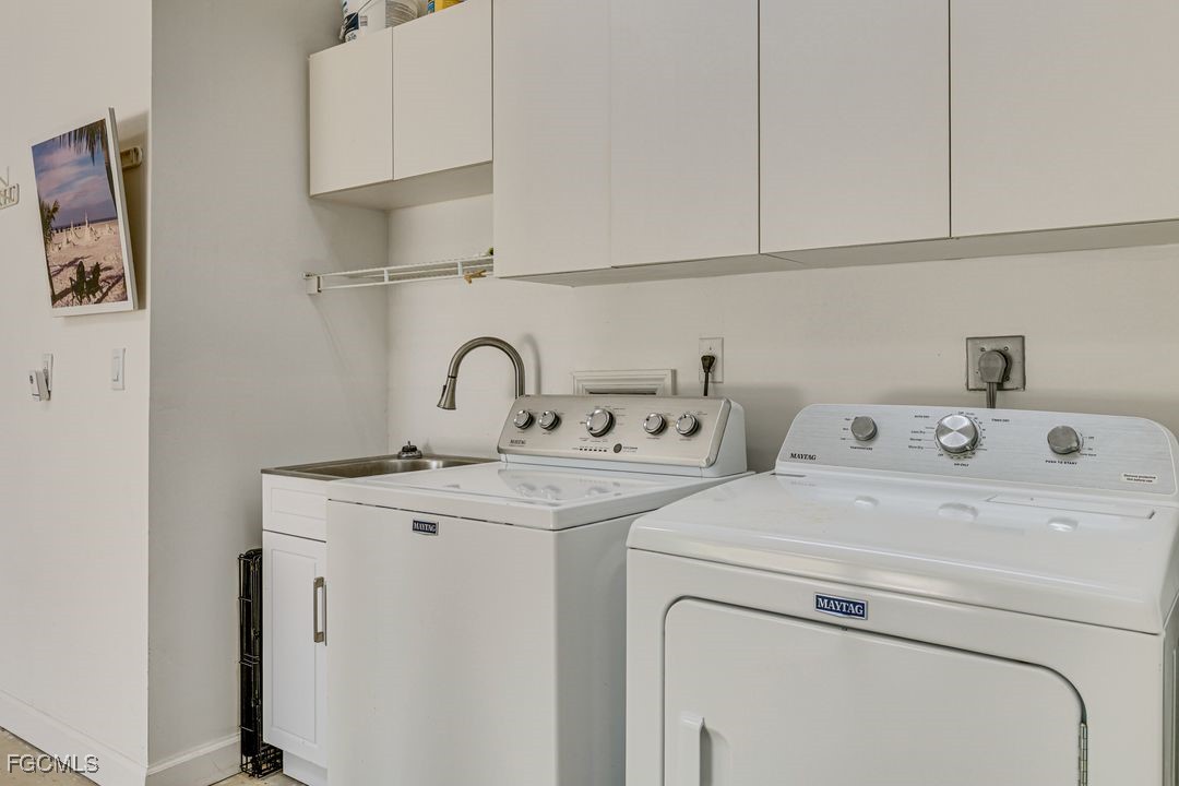 15340 River By Road Fort Myers, FL 33908 - Photo 21 of 21 a utility room with dryer and washer