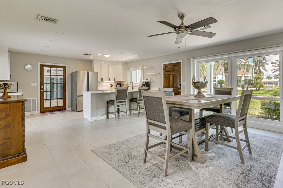 15340 River By Road Fort Myers, FL 33908 - Photo 4 of 21 a view of a dining room with furniture window and outside view