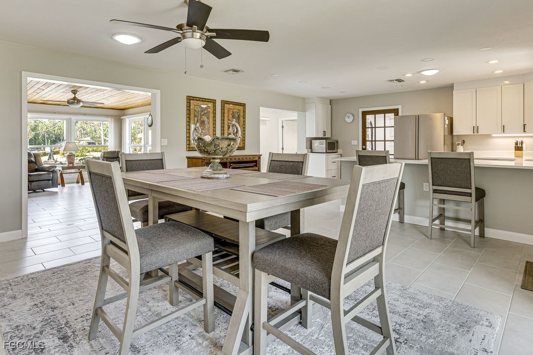 15340 River By Road Fort Myers, FL 33908 - Photo 6 of 21 a view of a dining room with furniture