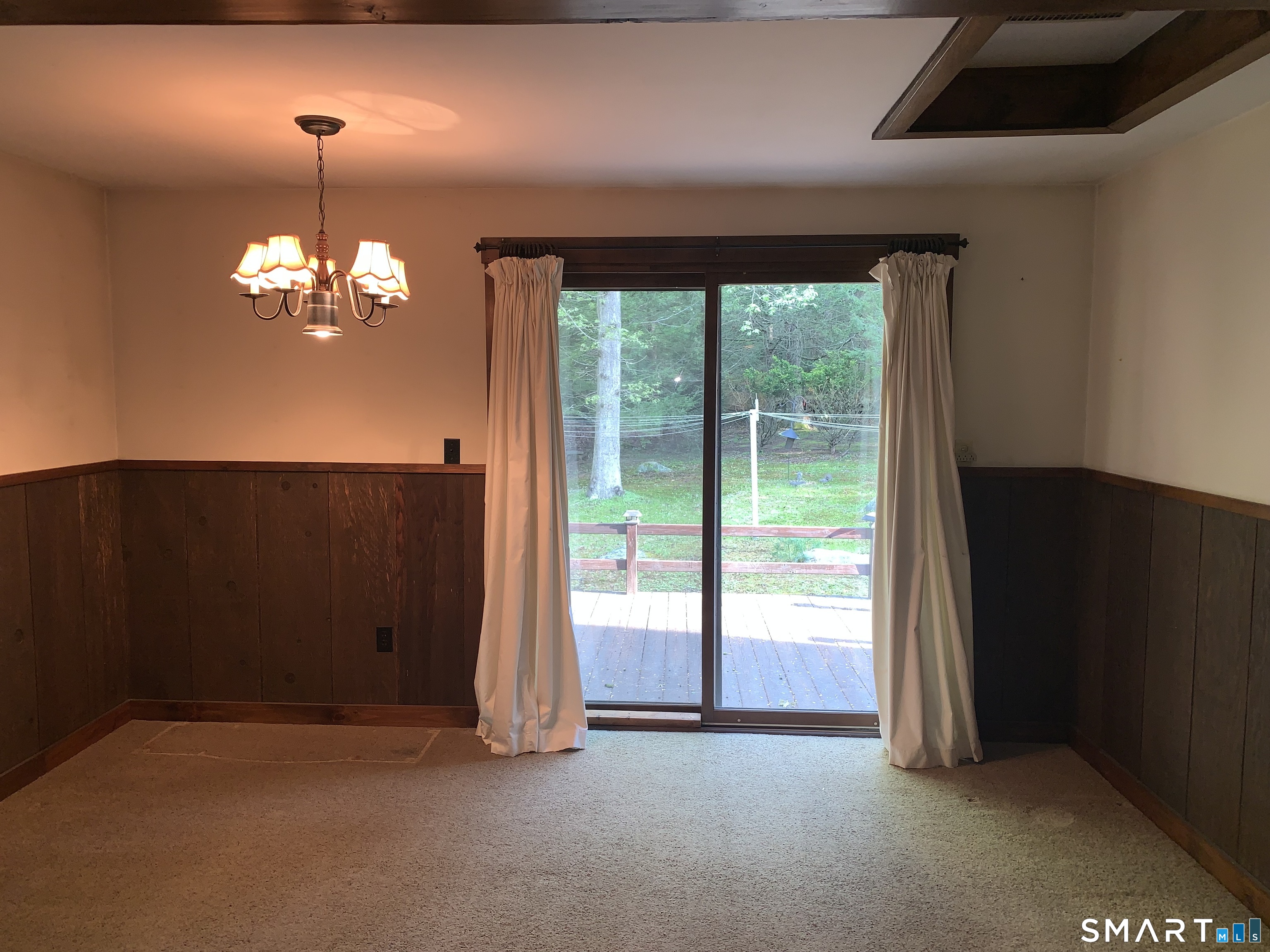 46 Mashapaug Road Union, CT 06076 - Photo 14 of 26 Family Room (alt) w/Slider to Deck