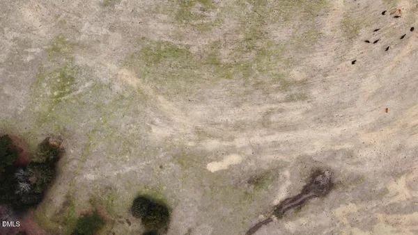 a view of a yard with a snow